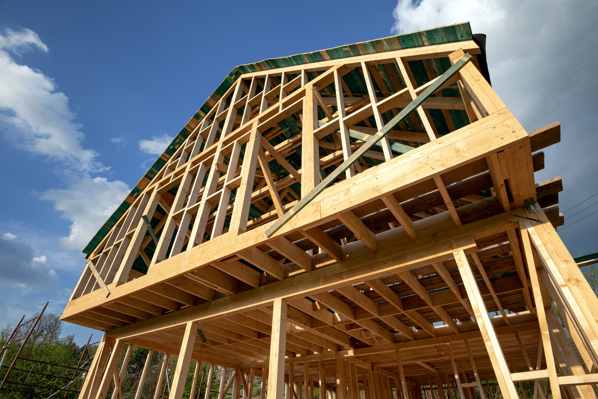 Residential home construction, frame wooden house outdoor