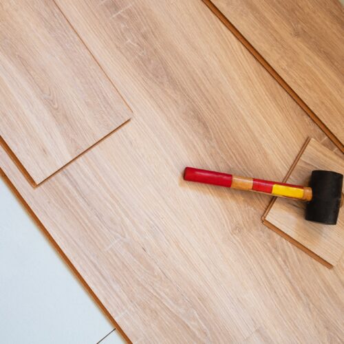 Hammer for installing laminate on boards